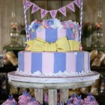 baby shower fondant cake and cupcakes