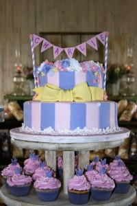 baby shower fondant cake and cupcakes