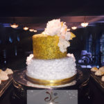 ruffles and gold accent fondant cake